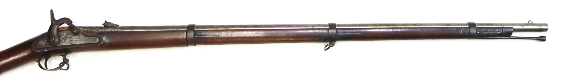 Antique muzzle-loading rifle with a wooden stock, metal barrel, and iron sights, shown in a side view on a white background.