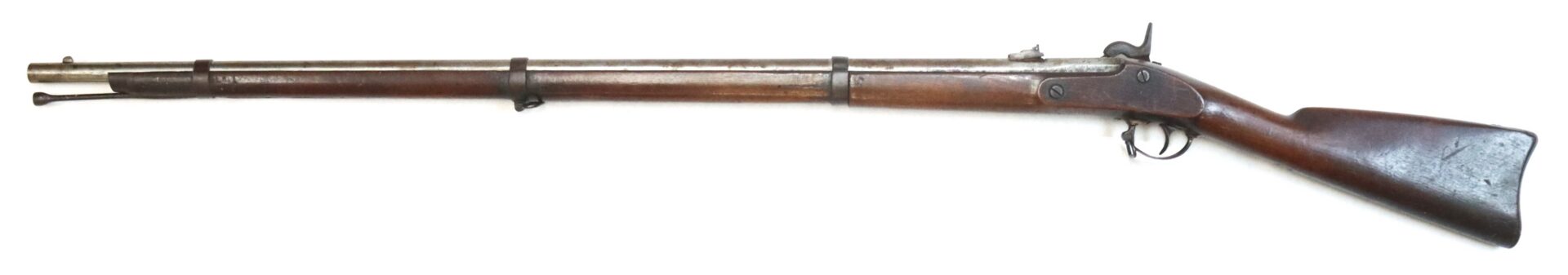A vintage, single-shot, muzzle-loading rifle with a wooden stock and metal barrel, photographed on a white background.