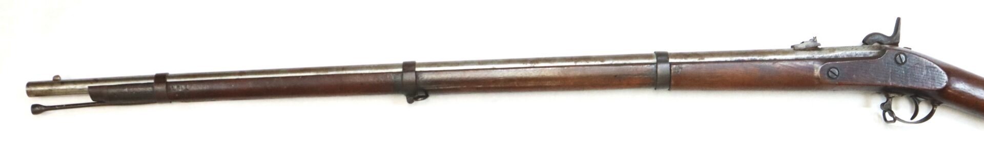A vintage, single-shot, muzzle-loading rifle with a wooden stock and metal barrel, shown from the side against a white background.