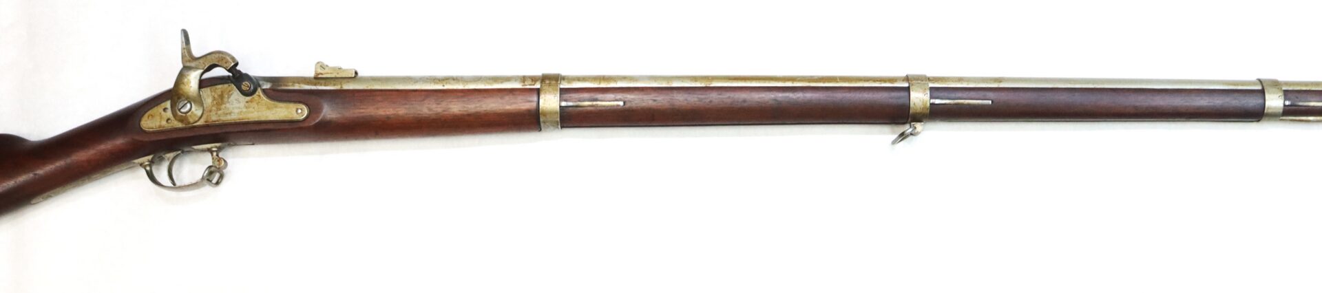 Side view of an antique percussion cap musket with a wooden stock, metal barrel, and metal bands against a white background.
