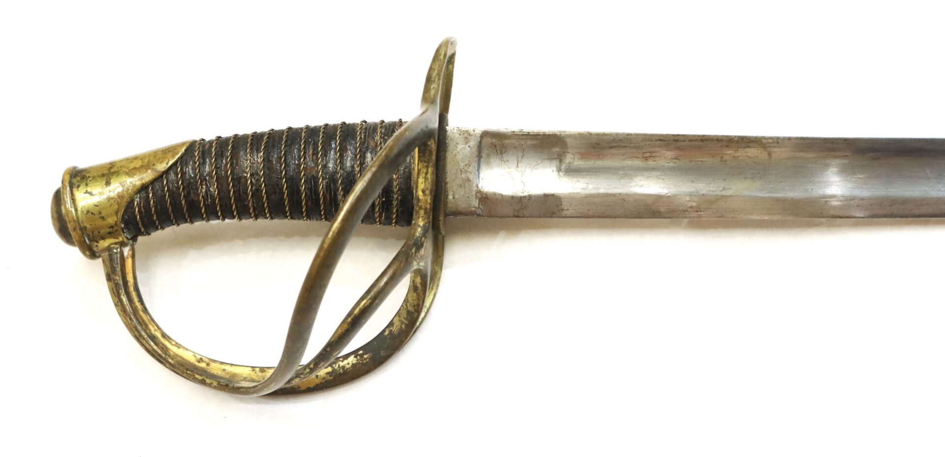 Antique sword with a curved brass guard, wrapped grip, and straight metal blade, shown against a white background.