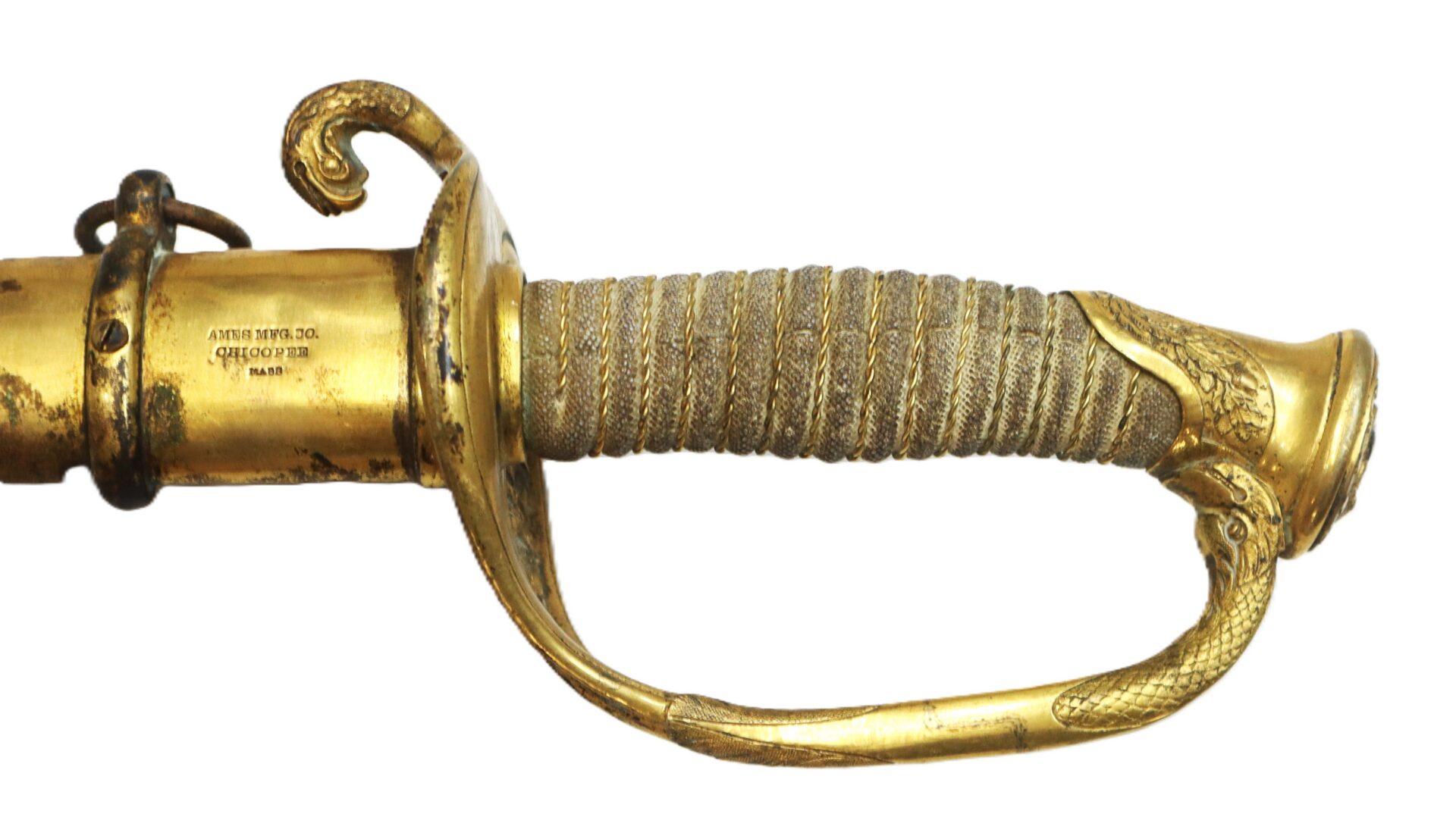 Close-up of an ornate sword hilt with a gold-colored handguard featuring a decorative snake design and a textured grip wrapped in wire.