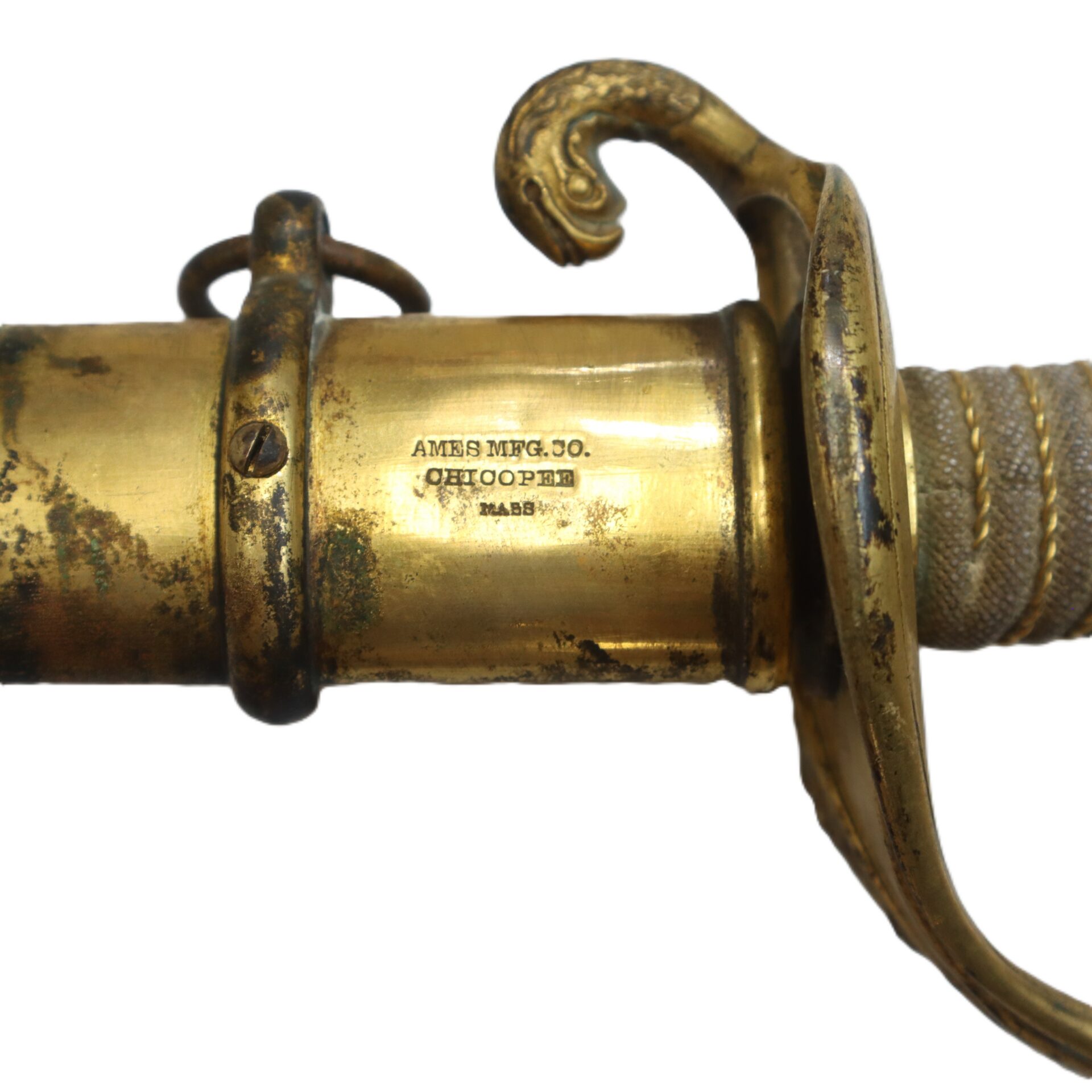 Close-up of a gold-colored sword hilt, showing engraved text "AMES MFG. CO. CHICOPEE MASS" on the metal near the guard.