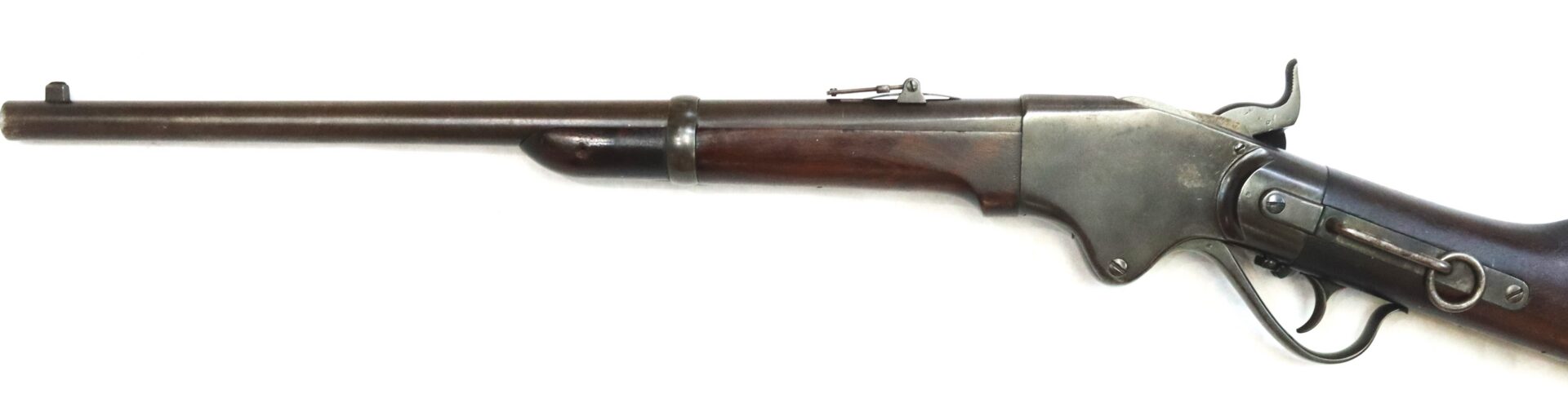 A vintage lever-action rifle with a wooden stock and metal barrel, displayed on a white background.