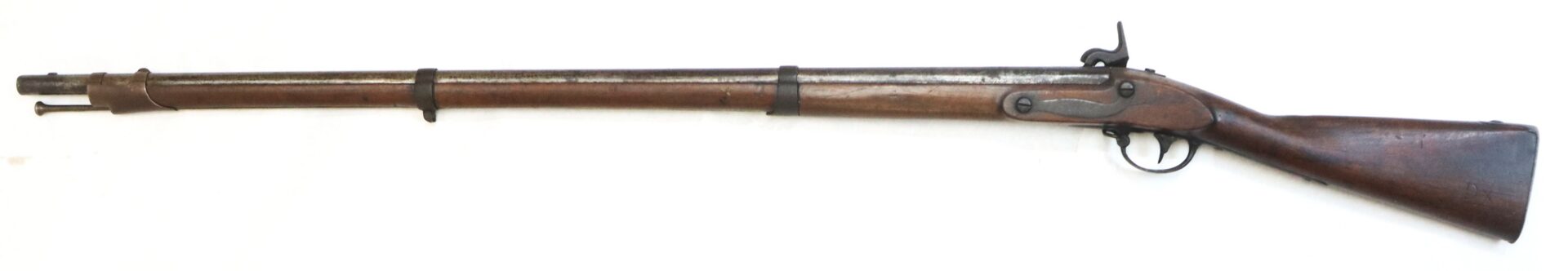 A vintage, wooden-stock muzzle-loading rifle with a metal barrel and trigger mechanism, photographed on a white background.
