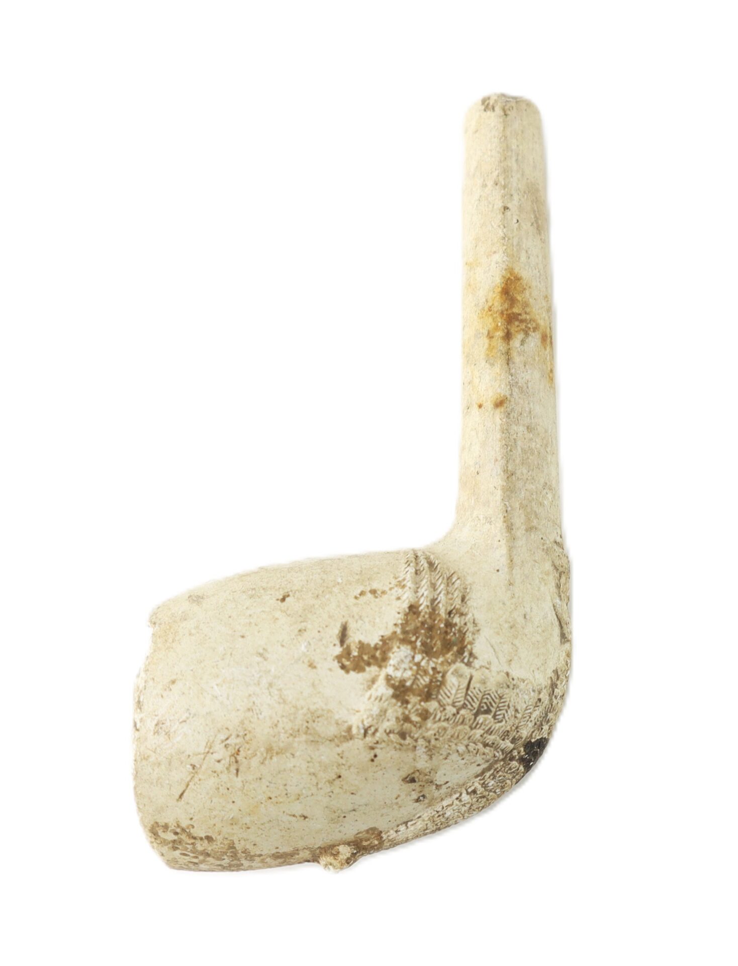 A worn, white clay tobacco pipe with a short stem and a slightly rounded bowl, isolated on a white background.