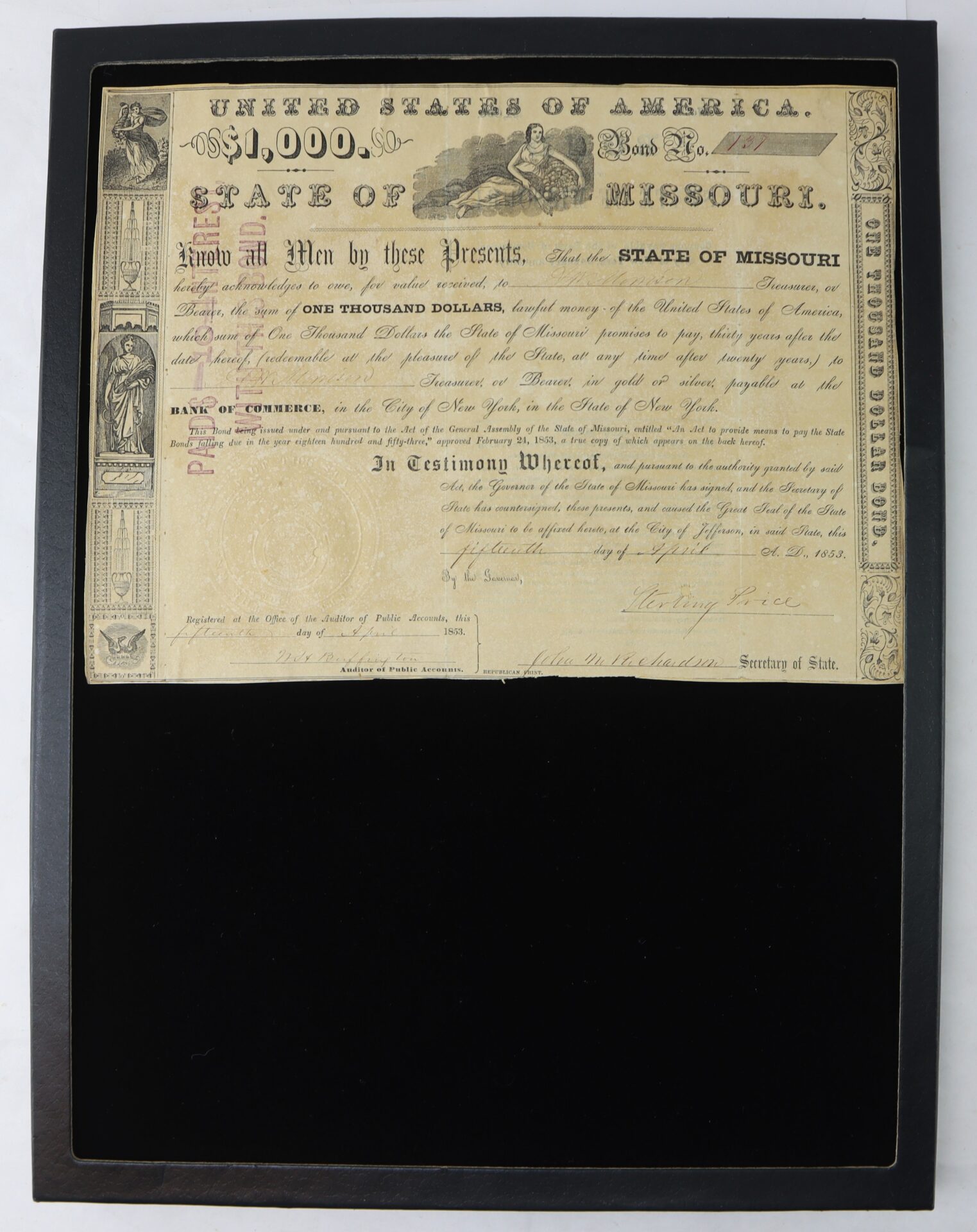 Historic document from the State of Missouri, dated 1882, certifies a $1,000 bond with printed and handwritten text, official seal, signatures, and decorative border elements.