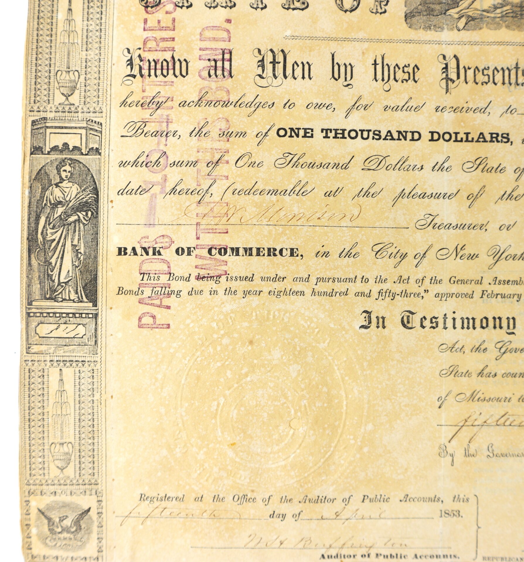 A close-up of an 1853 financial bond certificate with decorative borders, text detailing the bond’s value, and handwritten signatures at the bottom.