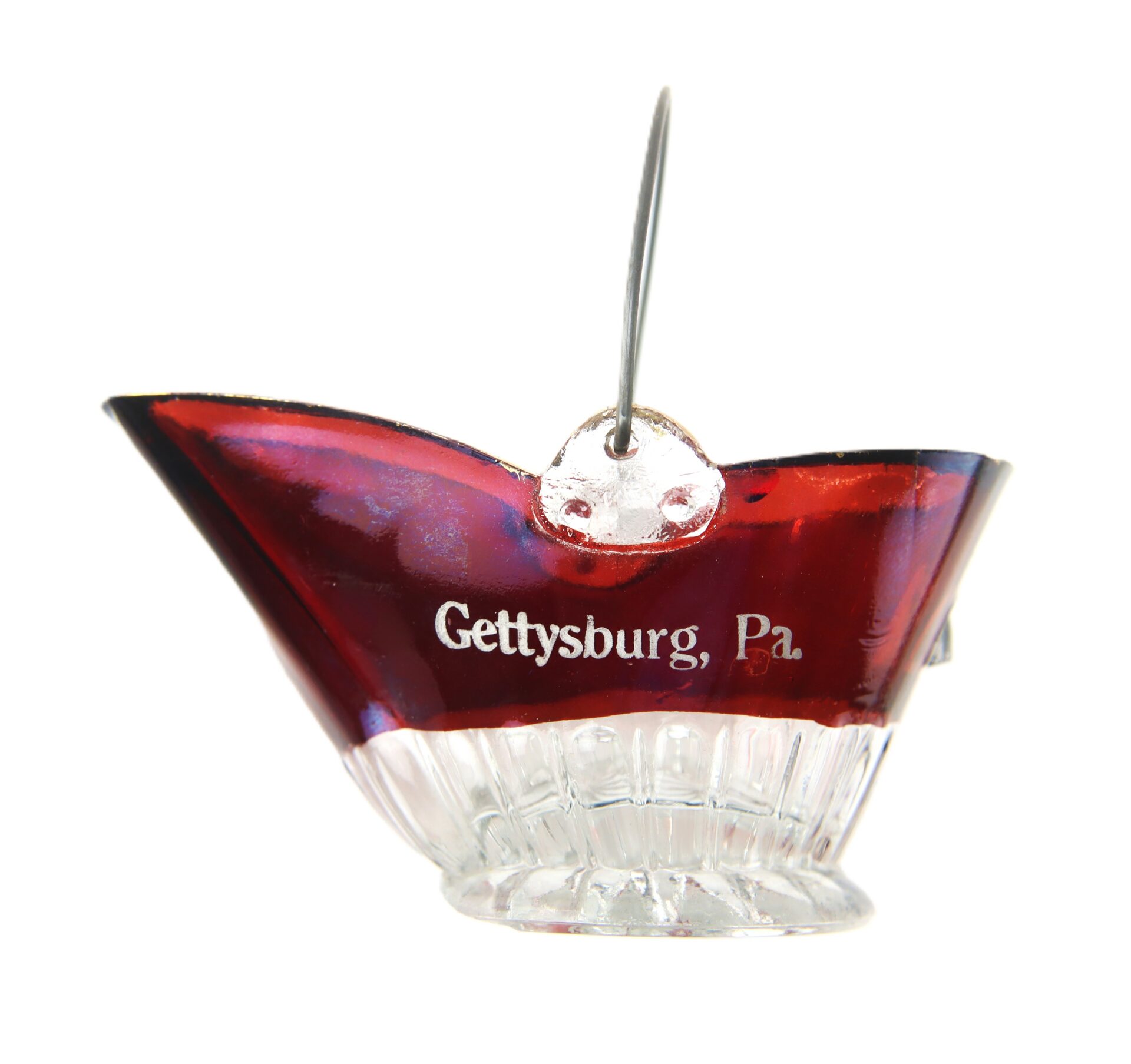 Glass souvenir basket with red rim and clear base, featuring the text “Gettysburg, Pa.” and a metal handle attached.