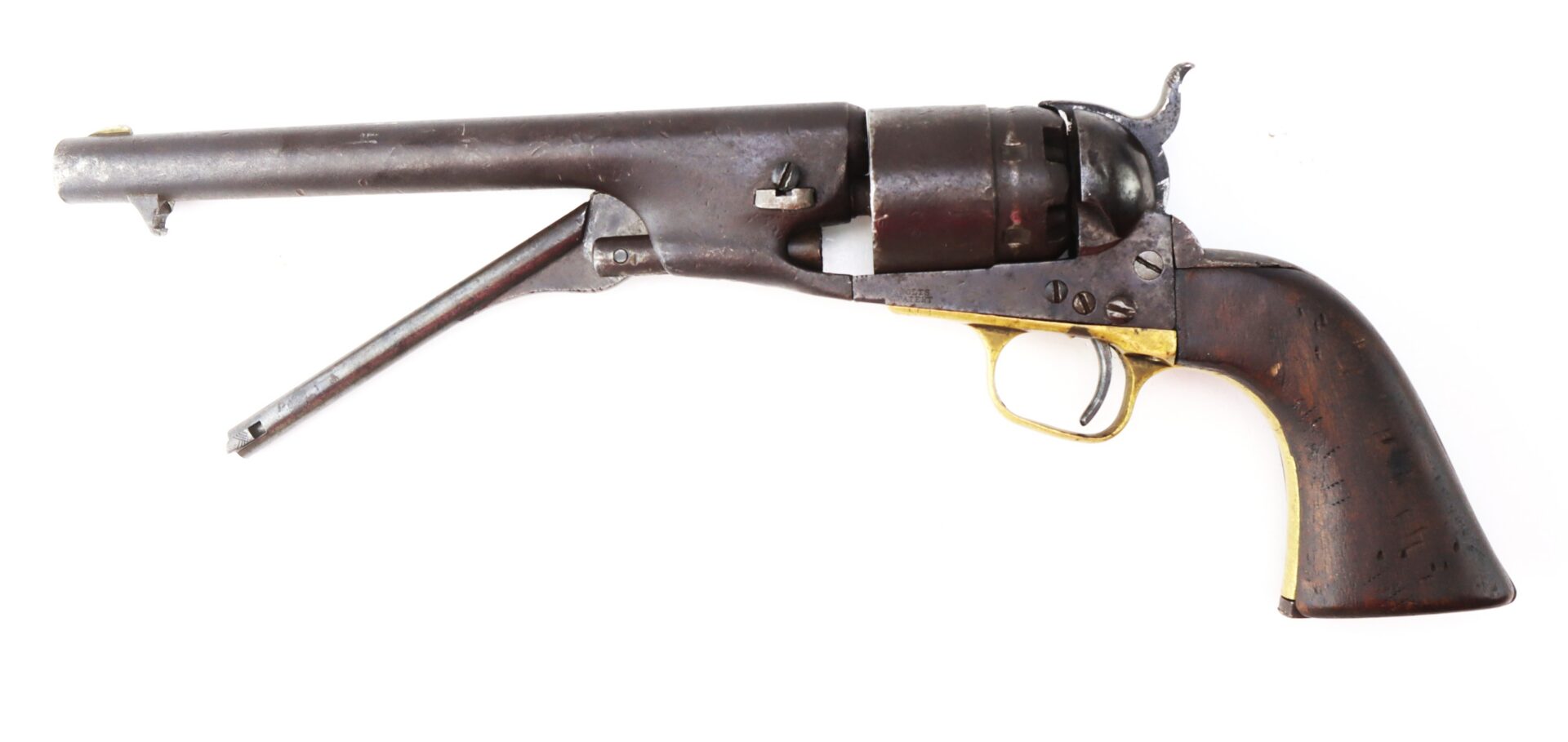 Antique black powder revolver with a brass trigger guard, wooden grip, and visible loading lever, shown in profile on a white background.