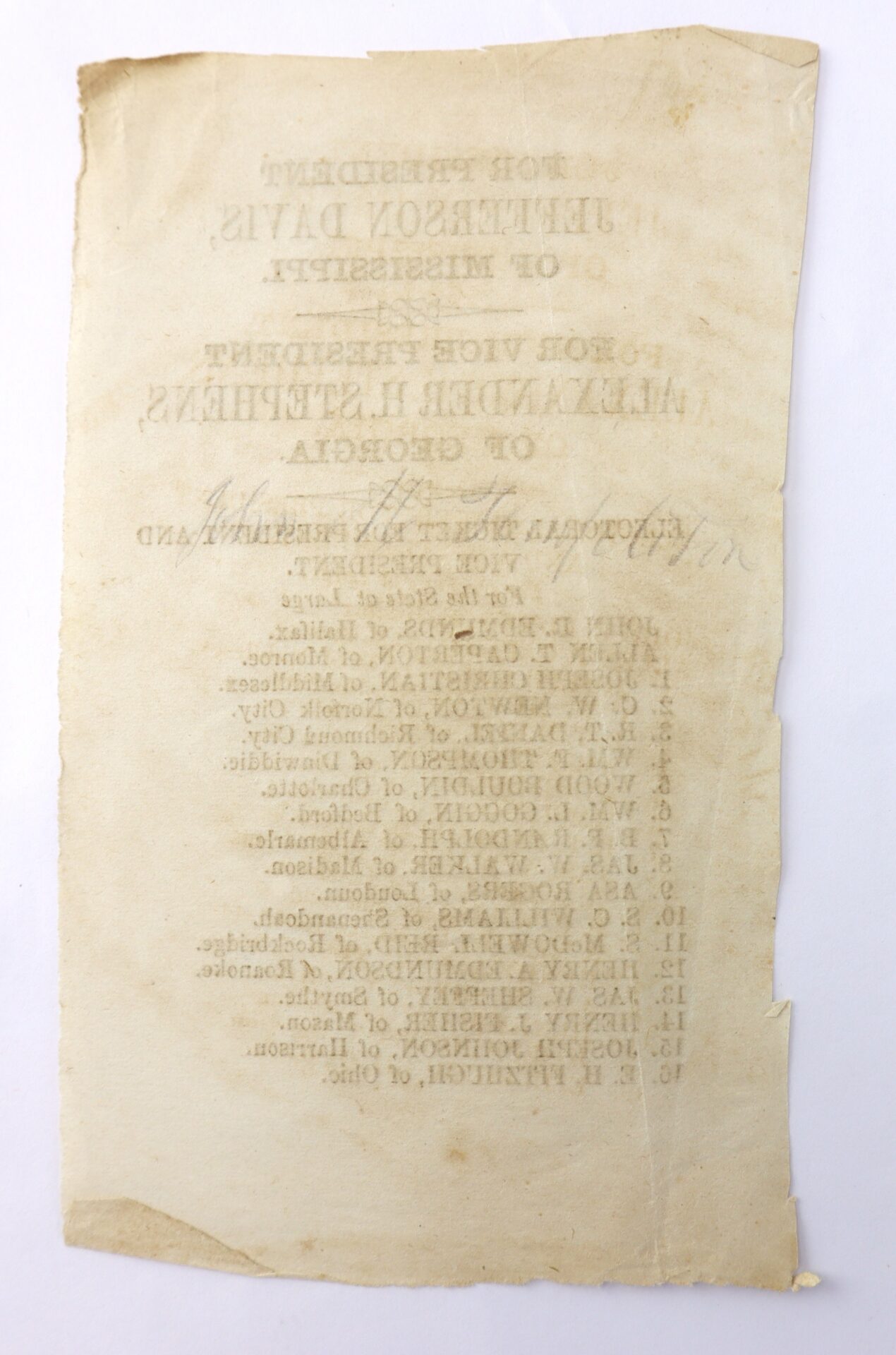 A worn, yellowed historical document with reversed, faded text listing Jefferson Davis and Alexander Stephens. The page has visible creases and torn edges.