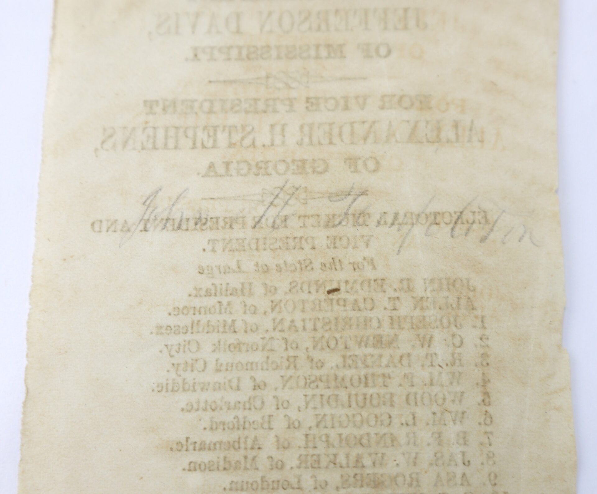 A faded, vintage printed document with handwritten notes, featuring partially legible text about Jefferson Davis and Georgia elections.