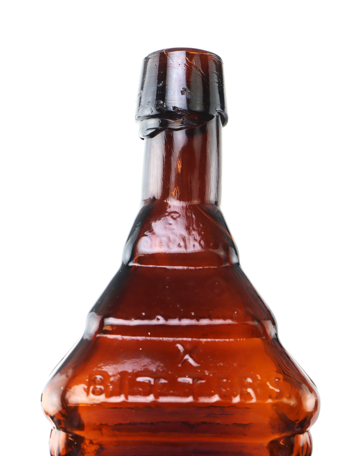 Close-up of the top portion of an amber glass bottle with a black wax seal on the neck, against a white background.