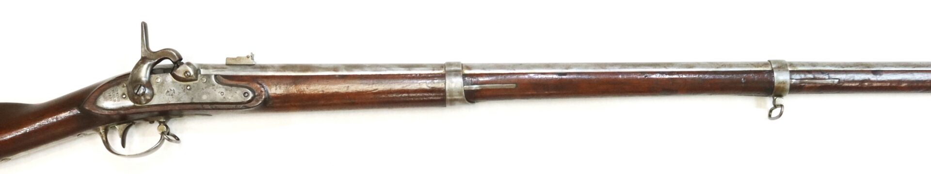 A vintage muzzle-loading rifle with a wooden stock, metal barrel, and iron sights, displayed on a white background.