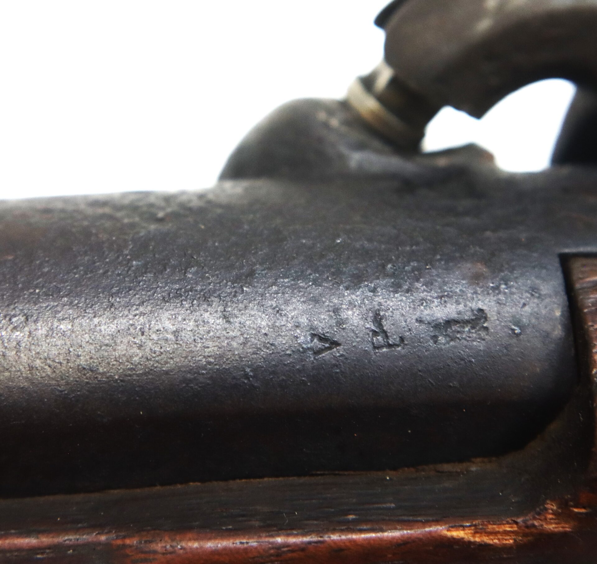 Close-up of a Model 1842 .69 Caliber Springfield Smoothbore Musket barrel showing a stamped proof mark.