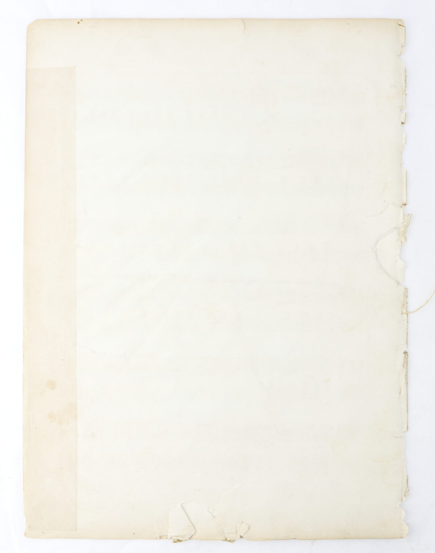 A worn, blank sheet of paper with visible creases, small tears along the right and bottom edges, and slight discoloration on a white background.