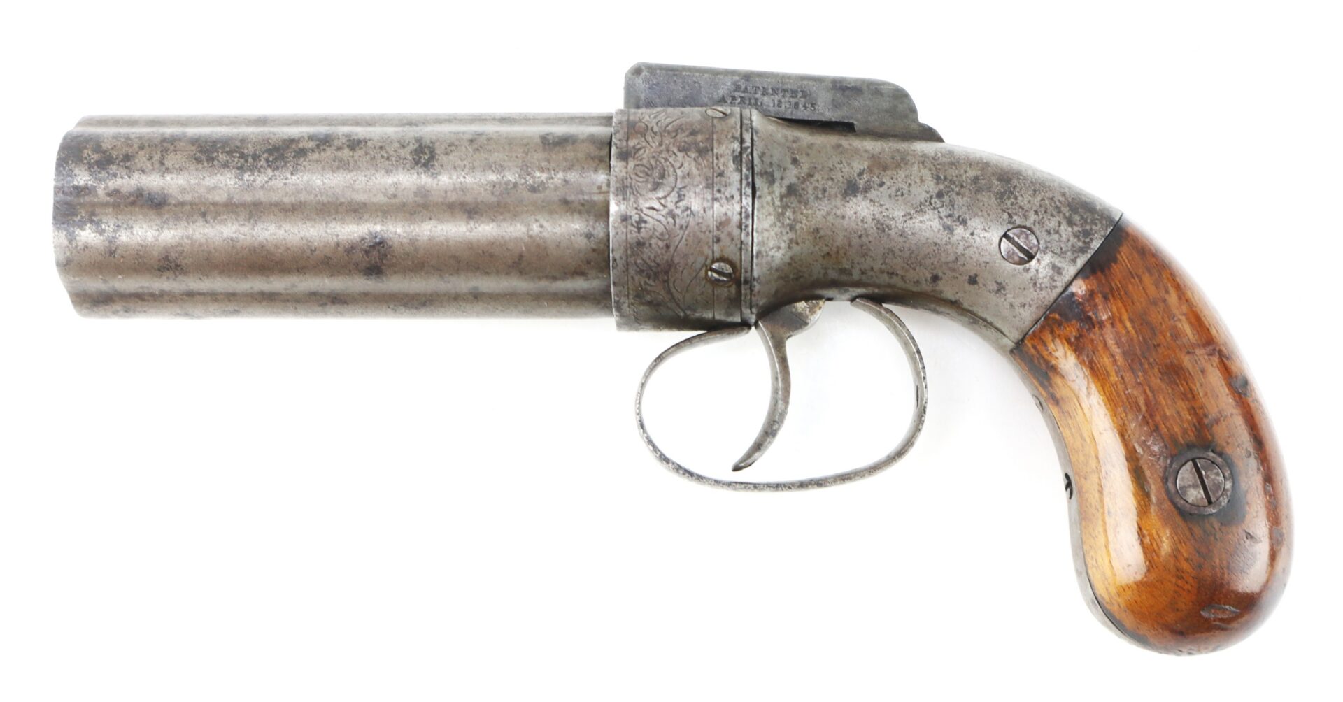 Antique double-barrel pistol with a metal frame and trigger, featuring a wooden grip handle; side view on a white background.