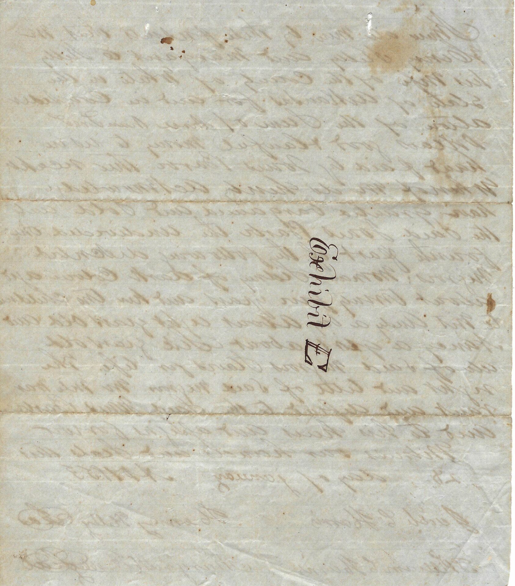 Aged handwritten letter with cursive text visible on both sides of the paper; a number and small drawing are written vertically in dark ink near the center.