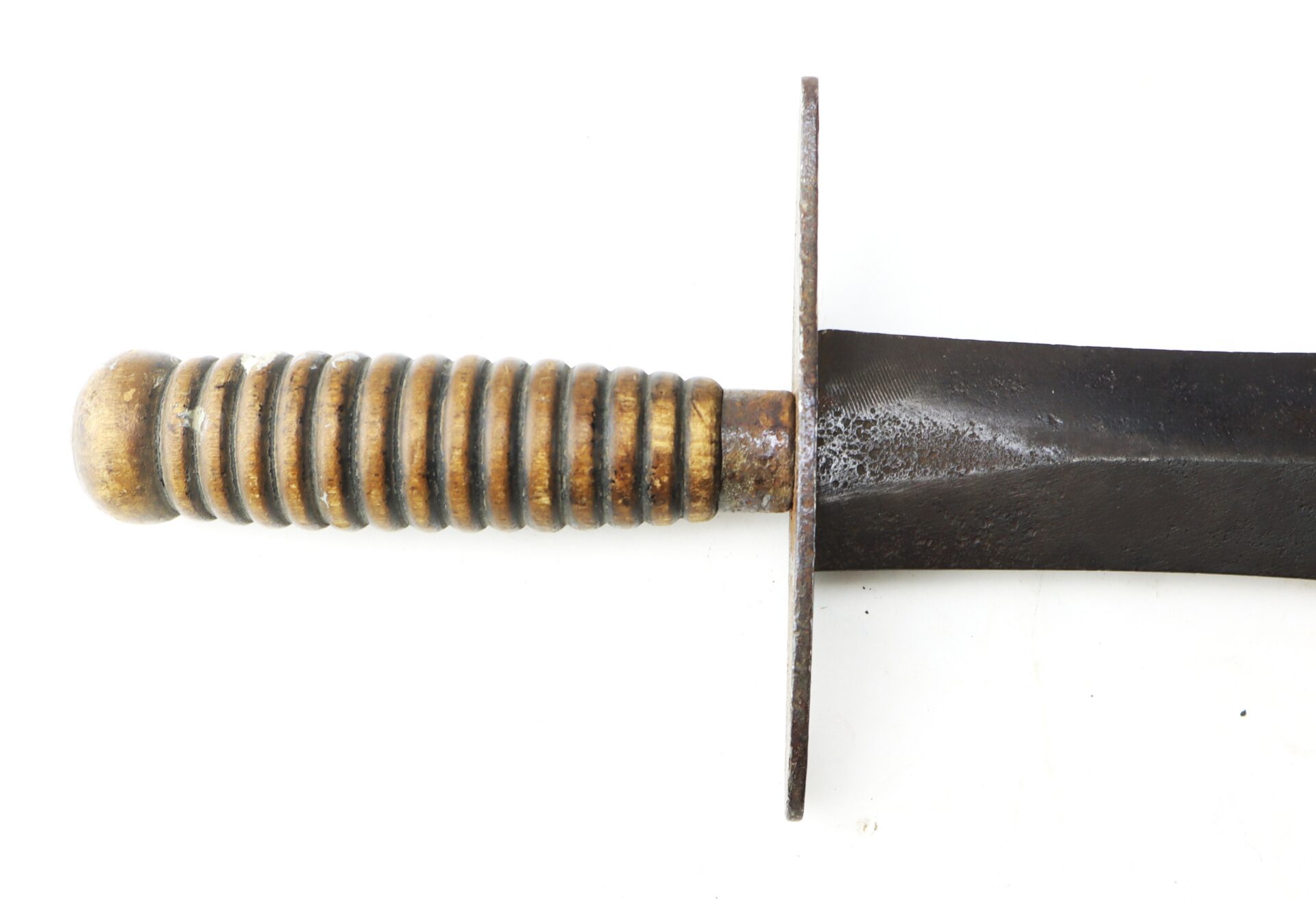 A knife with a ribbed, cylindrical metal handle, a flat crossguard, and a dark metal blade.