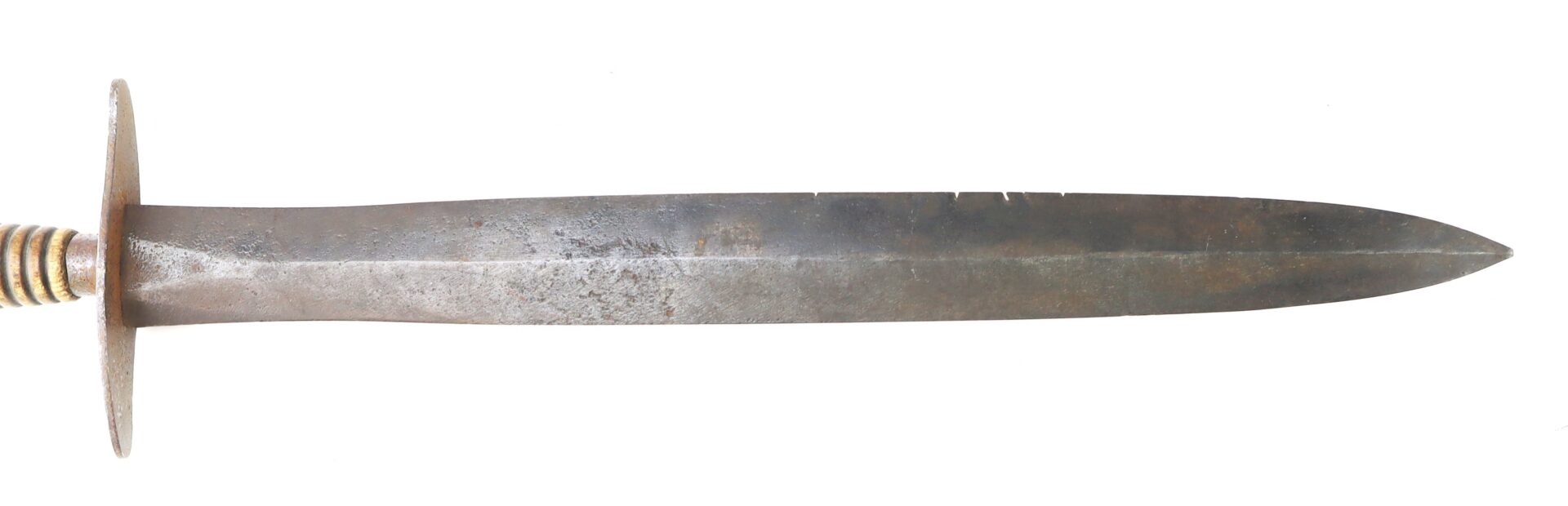 A double-edged, metal bladed weapon with a circular crossguard and a ribbed handle.